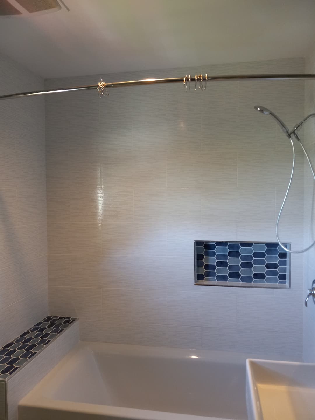 picture of a finished bathroom remodel with custom tiles and sinks in portland oregon